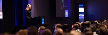 Person speaking at event